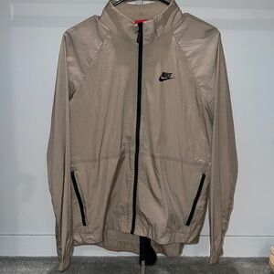 Limited edition NWT women’s Nike brown windbreaker jacket